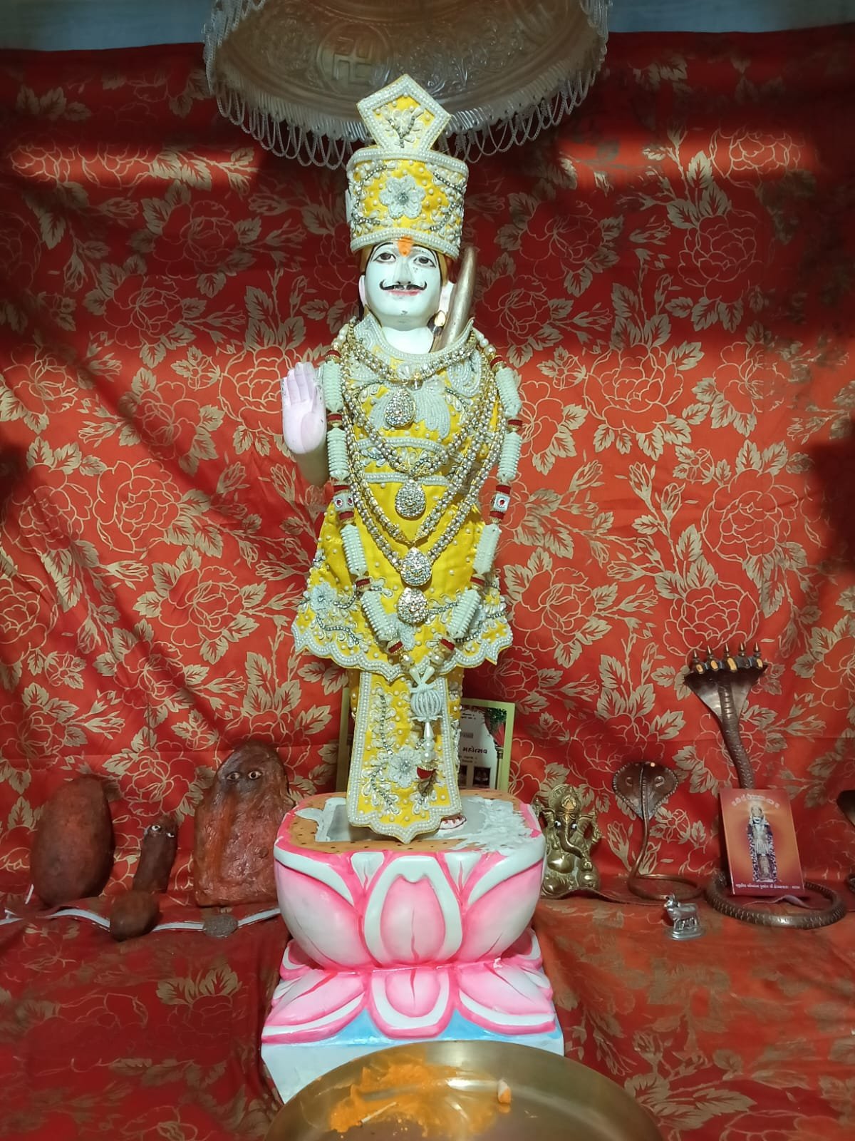 Decorated deity